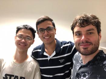 Aman Ladia (center) joined Andrew Miller (right) and his students this summer for an in-depth research experience at the University of Illinois.