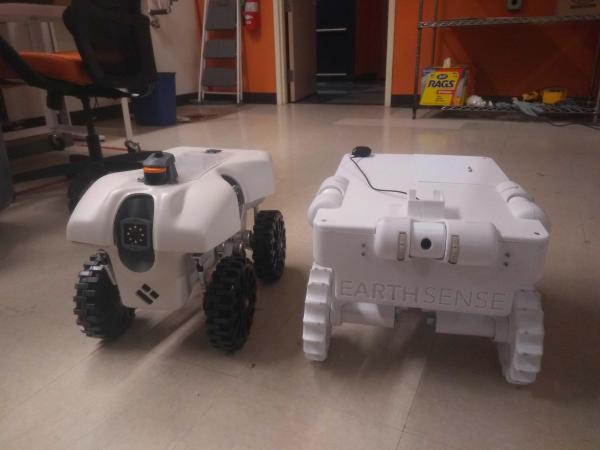 Two different generations of the AgBots, side by side.