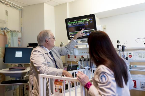 Researchers monitor a baby's vitals via the patch readings. (Photo courtesy of John Rogers)