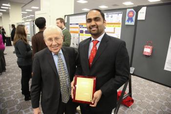 Arjun Athreya (right) received the 2017 Presidential Trainee Award and Jason Morrow Trainee Award at the American Society for Clinical Pharmacology and Therapeutics conference, two top awards that reflect the significance of his work in the field of precision medicine.