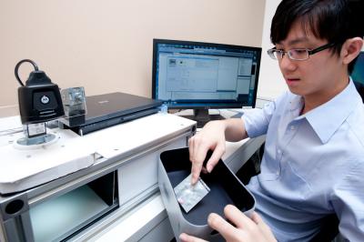 ADSC Research Scientist Gang Wang demonstrates the pill identification technology that was developed at ADSC and licensed to Singapore spinoff I3 Precision.