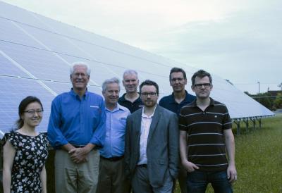 ICSEG researchers gave Wayne Hartel of the Illinois Department of Commerce and Economic Opportunity (DECO) a tour of the new solar array on the south side of Illinois' campus. Left to right: ICSEG post doctoral fellow Hao Zhu, ITI Associate Director Scott Pickard, ITI Managing Director of Smart Grid Technologies Alfonso Valdes, ITI researcher Tom Overbye, ITI Assistant Director of Testbed Services Tim Yardley, Hartel and ITI researcher Alejandro Dominguez-Garcia.  