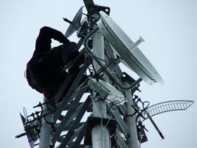 Servicing a wireless broadband distribution tower on the Santa Ysabel Indian Reservation. Photo Credit: Hope Hall