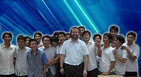 ECE Associate Professor Steve Lumetta (pictured here with his students) will teach a 2-week course at HoChiMinh City University of Technology. 