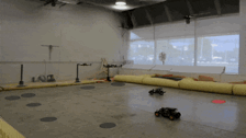 Drones flying in robotics lab